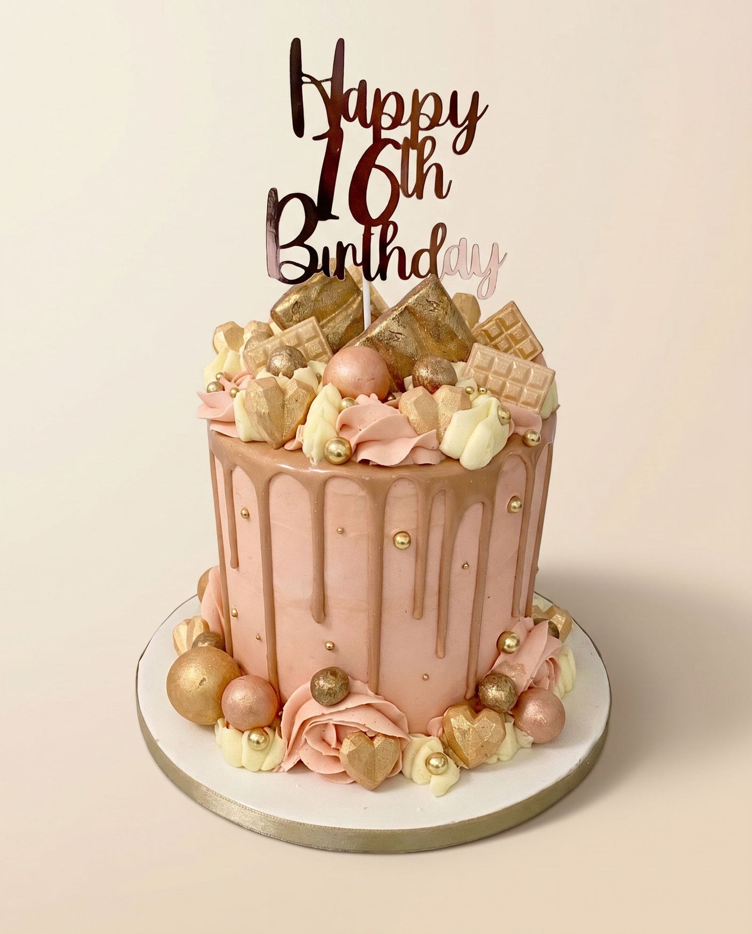 Rose gold chocolate bar drip cake with neutral buttercream tones and rose gold detailing, handmade by Daisy Mud Pie in Brentwood, Essex