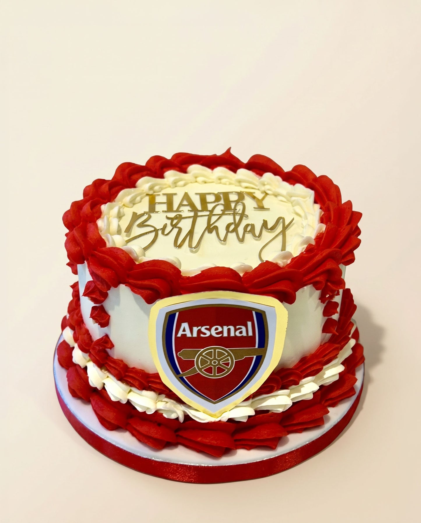 Buttercream celebration cake piped in football club team colours, handmade by Daisy Mud Pie in Brentwood, Essex