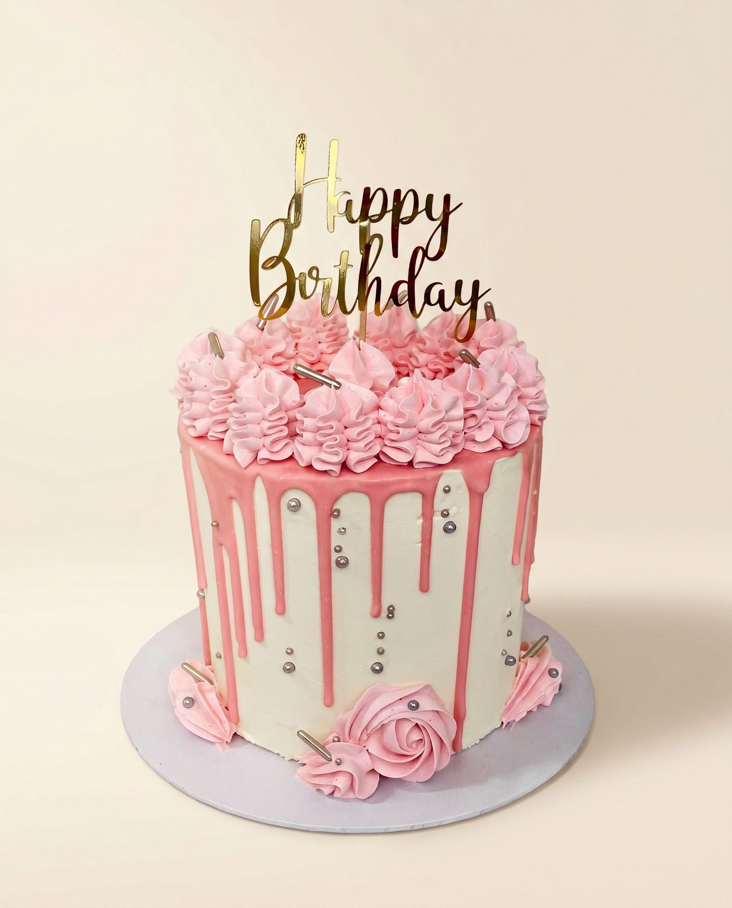 Pink chocolate bar drip cake with pink-toned buttercream and chocolate drip, handmade by Daisy Mud Pie in Brentwood, Essex